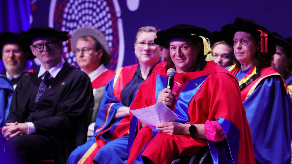 Para-athlete and honorary Doctor of Letters Louise Sauvage addresses UOW graduates. Picture by Sylvia Liber