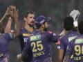 Mitchell Starc is congratulated by his Kolkata teammates for dismissing Jake Fraser-McGurk. (AP PHOTO)