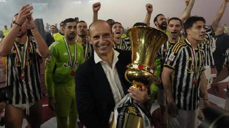 Juventus coach Massimiliano Allegri, here with his final trophy with the club, has been sacked. (AP PHOTO)