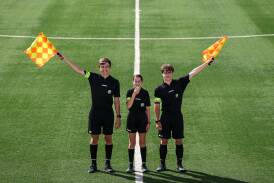Micah Leimbach (left), Olivia Volpato and Joshua Edwards donning their brand new yellow armbands to support Football South Coast's brand new initiative towards referee respect. Picture by Adam McLean