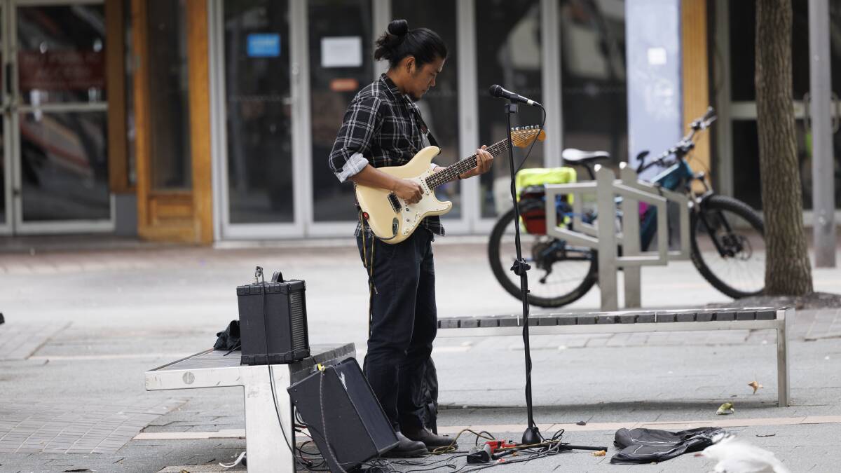 Buskers playing for cash face increasingly lean pickings. Picture by Keegan Carroll