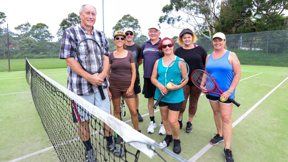 Members of the Wollongong 40+ Get Out and Have Fun Club Inc before they play at the Corrimal Tennis Courts. Picture by Adam McLean
