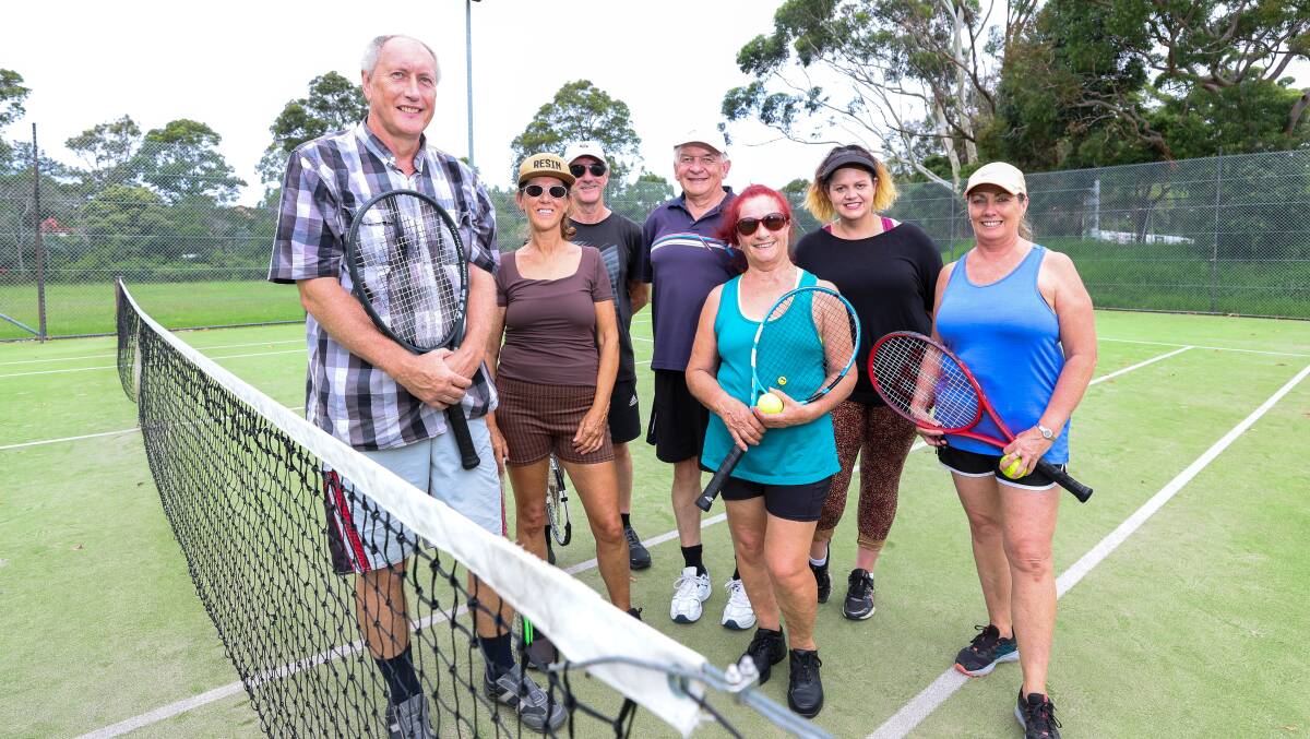 Members of the Wollongong 40+ Get Out and Have Fun Club Inc before they play at the Corrimal Tennis Courts. Picture by Adam McLean