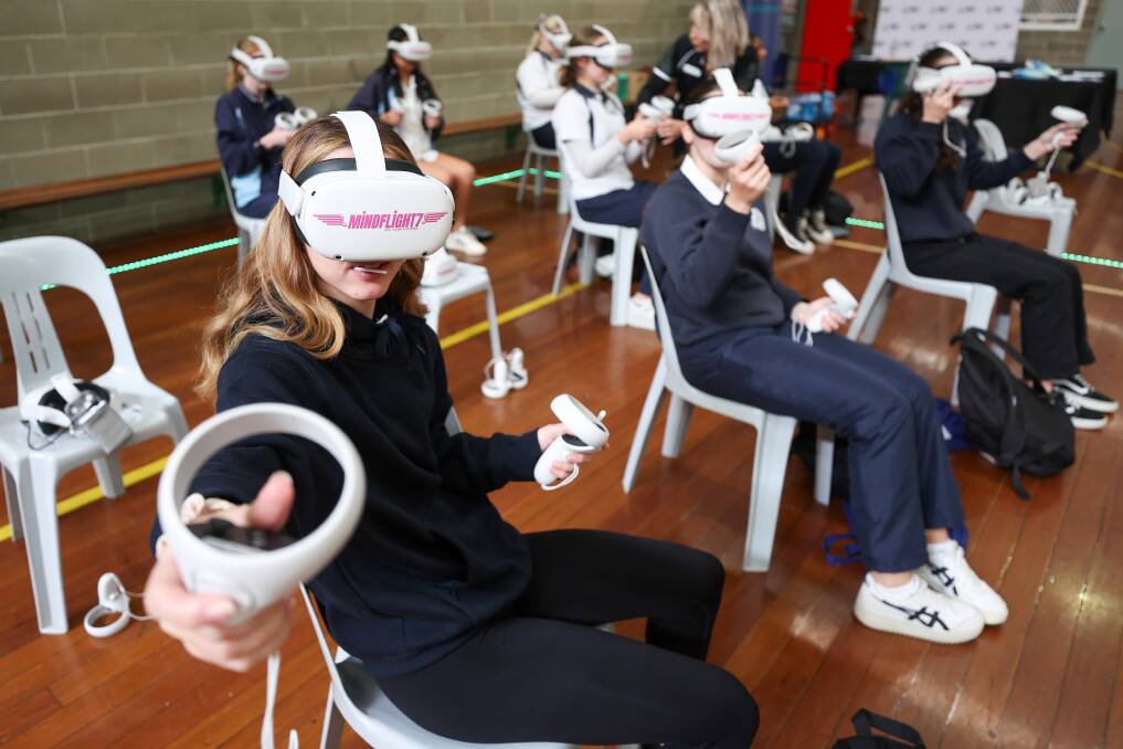 Year 10 student Ella Post from Nowra High Story uses Workplace Learning's VR Headset. Photo by Adam McLean