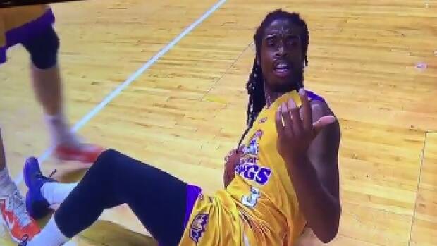 Baffled: Marcus Thornton looks up after a fan tipped beer on him during the game. Photo: YouTube
