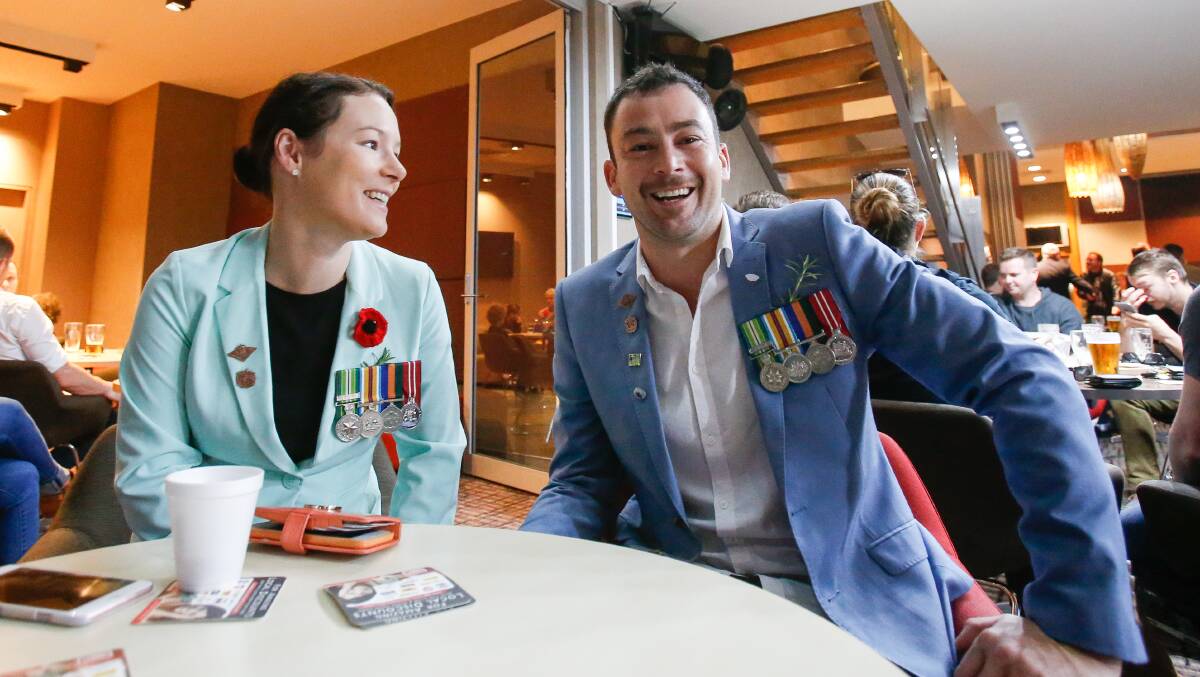 Navy veterans Annah Whittaker and Ryan Wilson at City Diggers RSL on Tuesday after the dawn service. Picture: ADAM McLEAN
