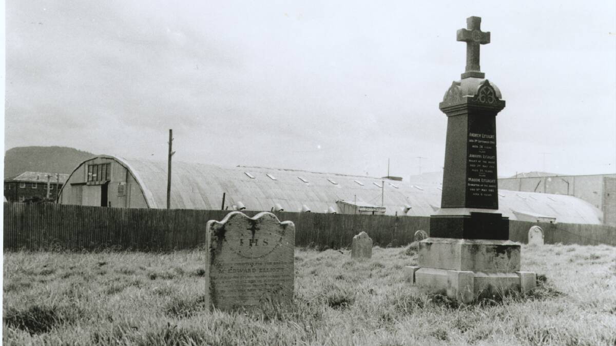 Roman Catholic Cemetery: When the cemetery land was built over in 1998, some of the remaining headstones were mounted on the wall. Picture: Supplied.