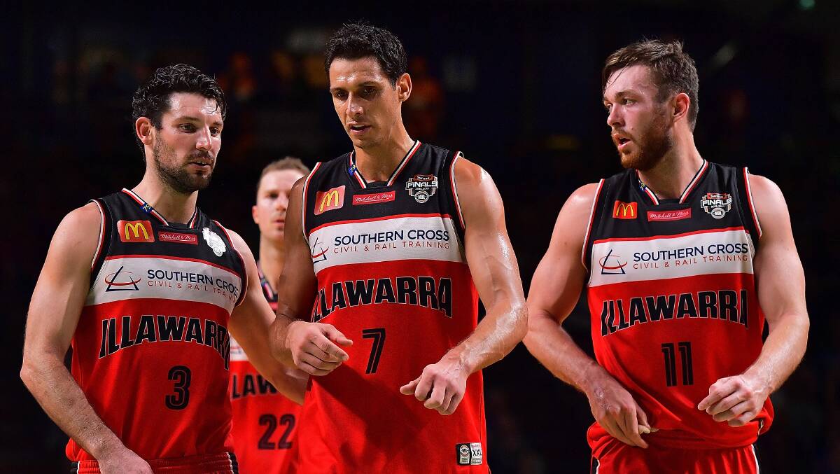 Kevin White, Oscar Forman and Nick Kay of the Illawarra Hawks during the game one NBL semi-final gainst Adelaide on February 16. Picture: GETTY IMAGES