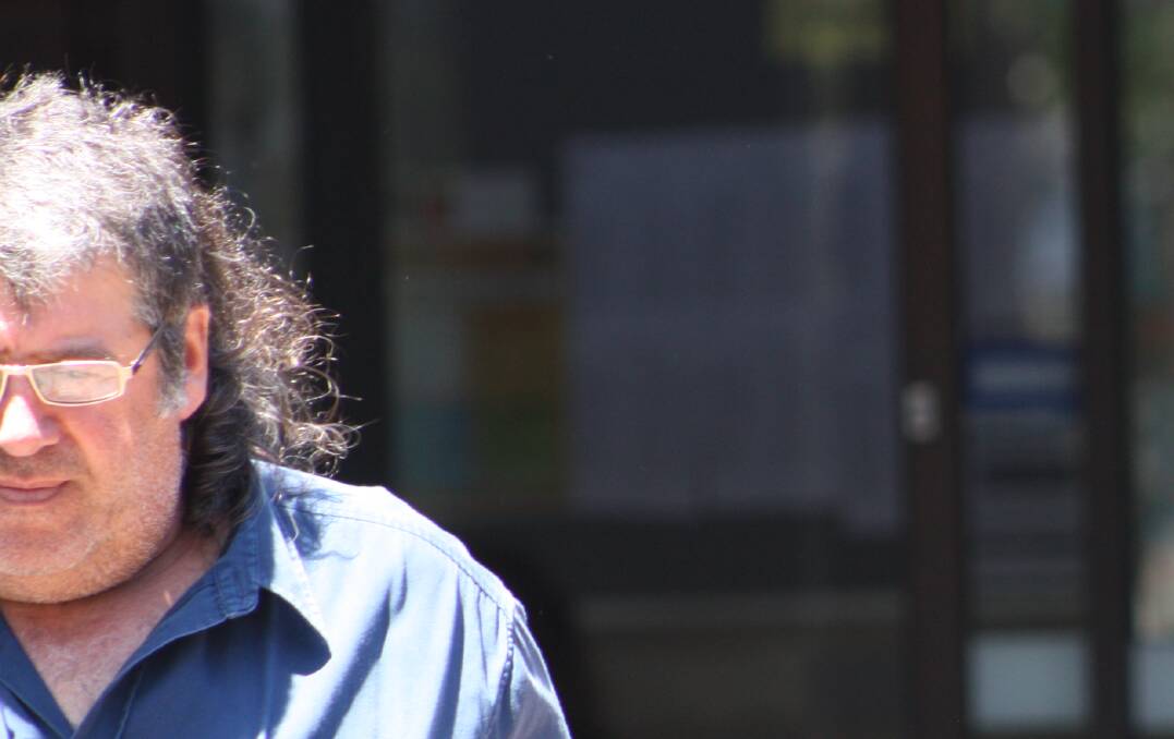 Pasquale Brancatisano tried to evade the media outside Wollongong Local Court on Wednesday.