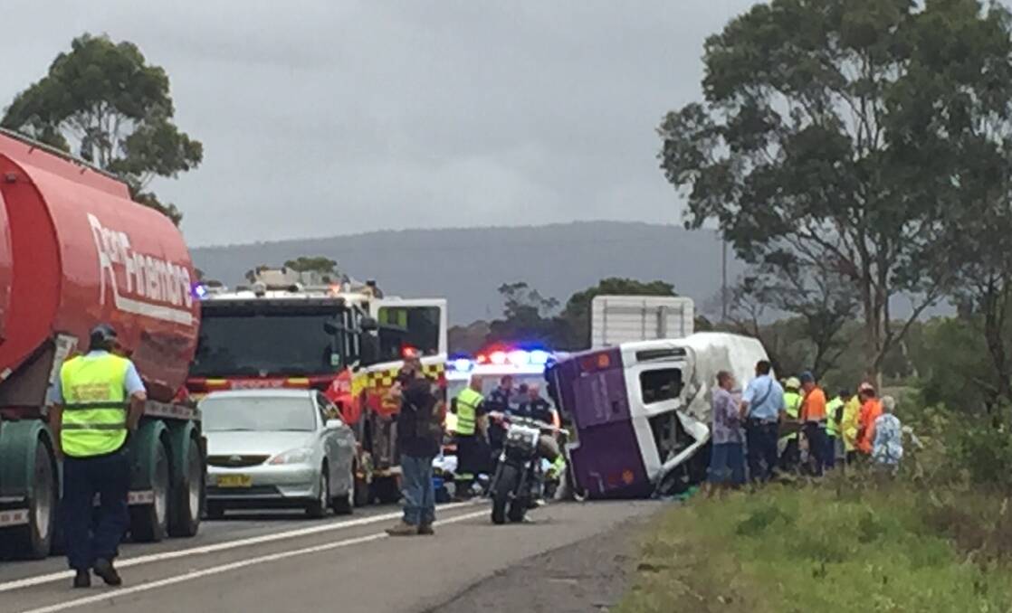 The Princes Highway is closed north of Yallah Road at Yallah after a serious bus accident that has injured multiple people.