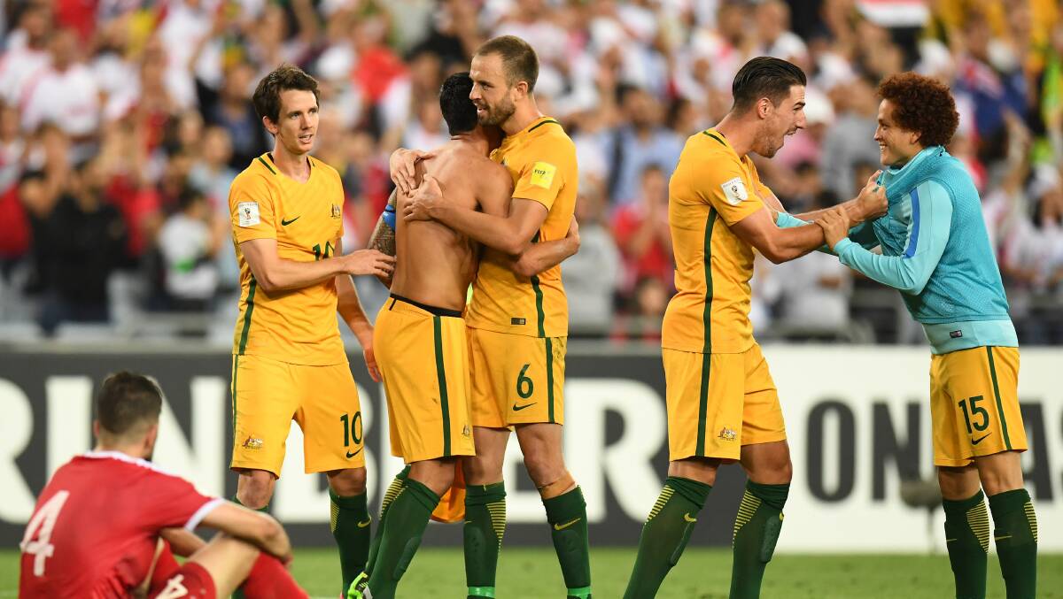 Australia celebrate their win over Syria. Picture: AAP