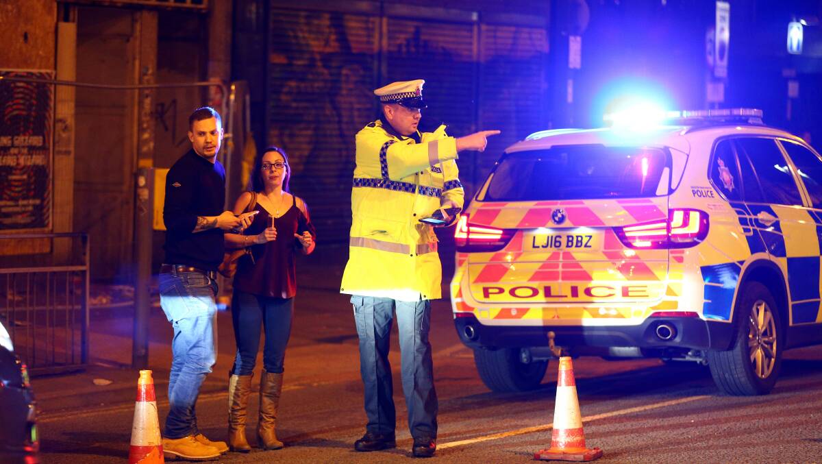 Police cordon off streets near Manchester Arena.  Photo: Getty Images