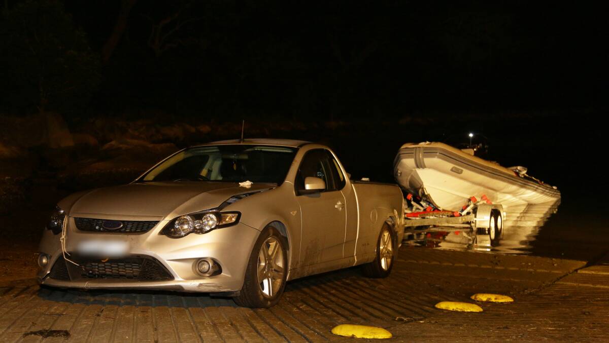 Police raid the dinghy as it docked at the tiny Parsley Bay boat ramp on the Central Coast. Photo: NSW Police Media