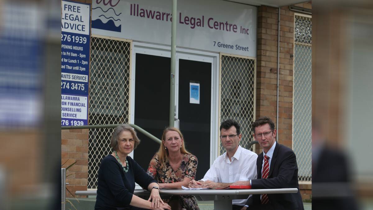 HELP US: The Illawarra Legal Centre's Karyn Bartholomew (left) and Phillip Dicalfas (second from right) join Labor MPs Sharon Bird and Stephen Jones. Picture: Robert Peet