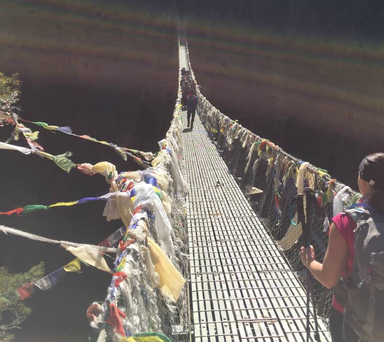 Prayer flags that adorn the suspension bridges and peaks are said to produce a spiritual vibration that is carried by the wind.