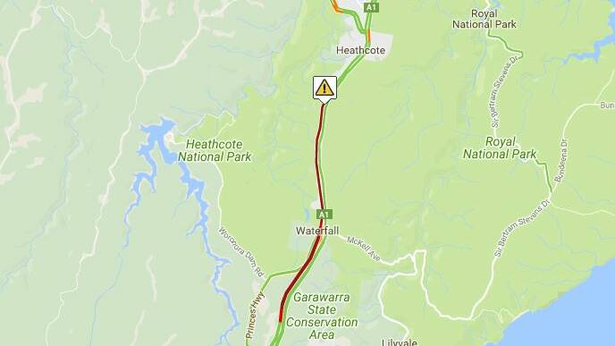 Traffic is queued back 8 kilometres after a crash on the Princes Highway near Waterfall.