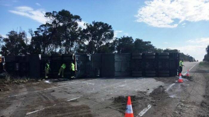 A truck carrying cheese has overturned on the Hume Motorway near Goulburn. Photo: NSW Police