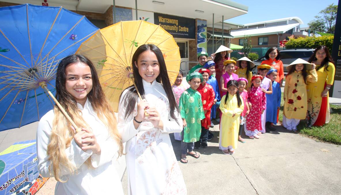 TET'S FAMILY: Romina Vo, Shayla Vo and friends from the the Wollongong Vietnamese community preparing for the Lunar New Year performance. Picture: Georgia Matts