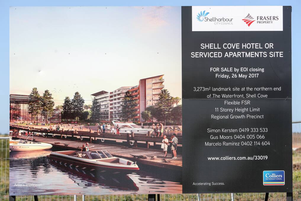 A sign on site at Shell Cove boat harbour in September advertised the "11 story height limit" and serviced apartments site.
