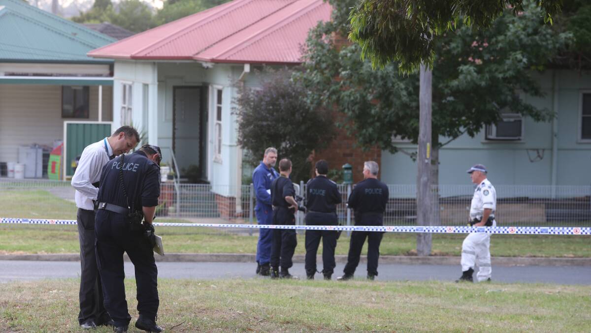 A crime scene has been established outside a Unanderra home. Picture: Robert Peet