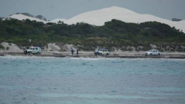 Emergency services at Kelp Beds, a remote surf break, on Monday afternoon. Photo: Caitlyn Rintoul
