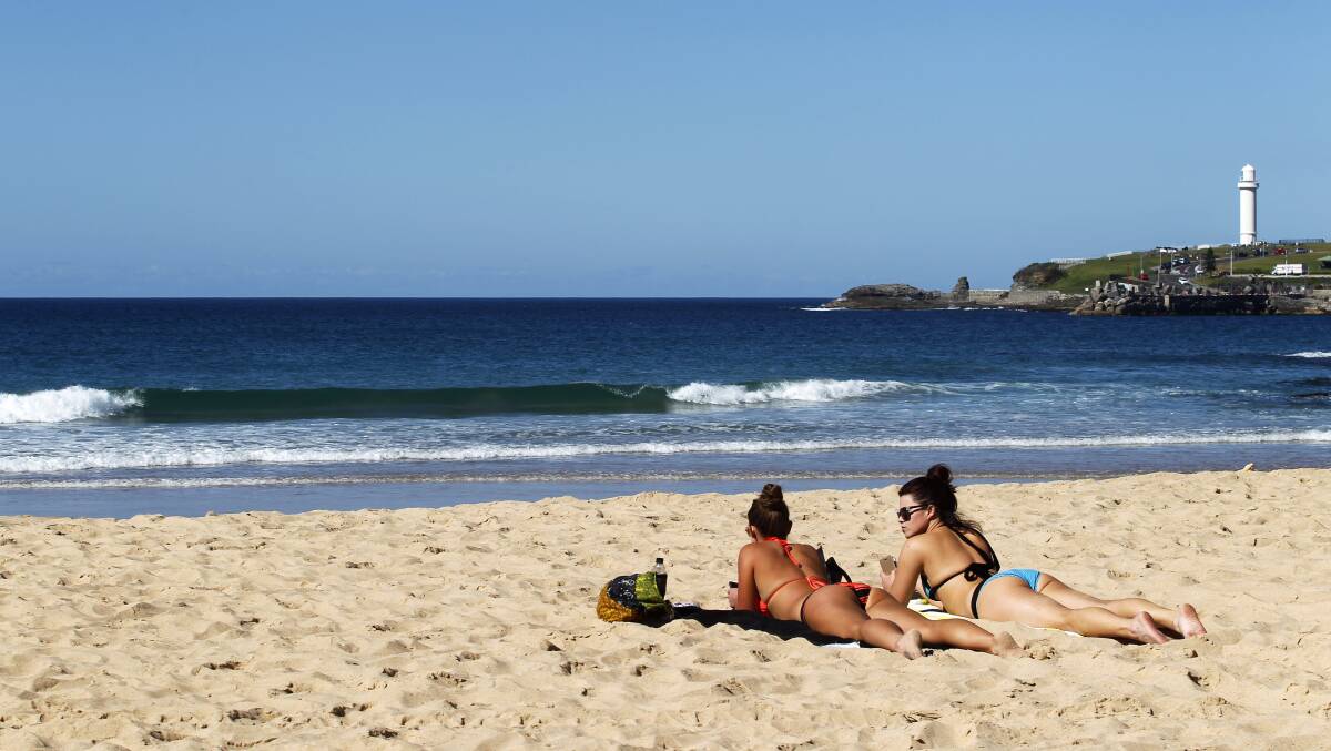 Beach-goers enjoyed the winter sun at North Beach, Wollongong in August last year. Picture: Anna Warr.