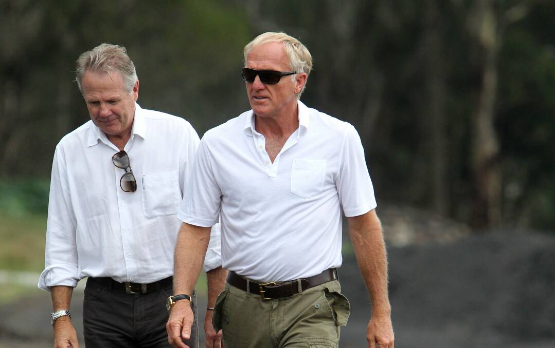 Greg Norman, right, inspecting the site in 2013. Picture: GREG TOTMAN