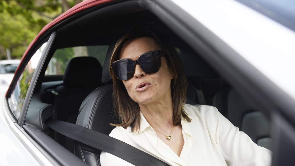 Lisa Wilkinson leaves her Sydney house, the morning after announcing her shock move from Nine to Ten. Photo: Nick Moir