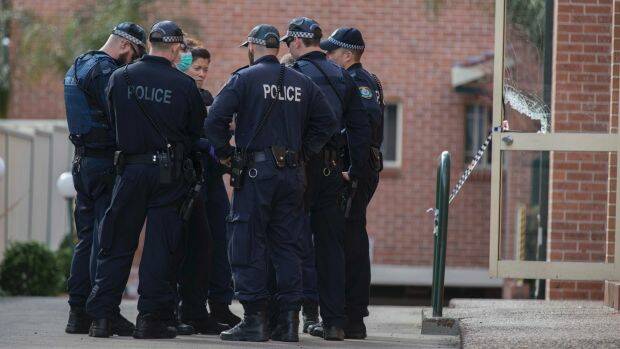 Police focus on the Lakemba unit, that was part of the raids, on Sunday. Photo: Michele Mossop