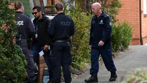 Police search a property in Lakemba in Sydney's south-west following sweeping terrorism raids. Photo: AAP
