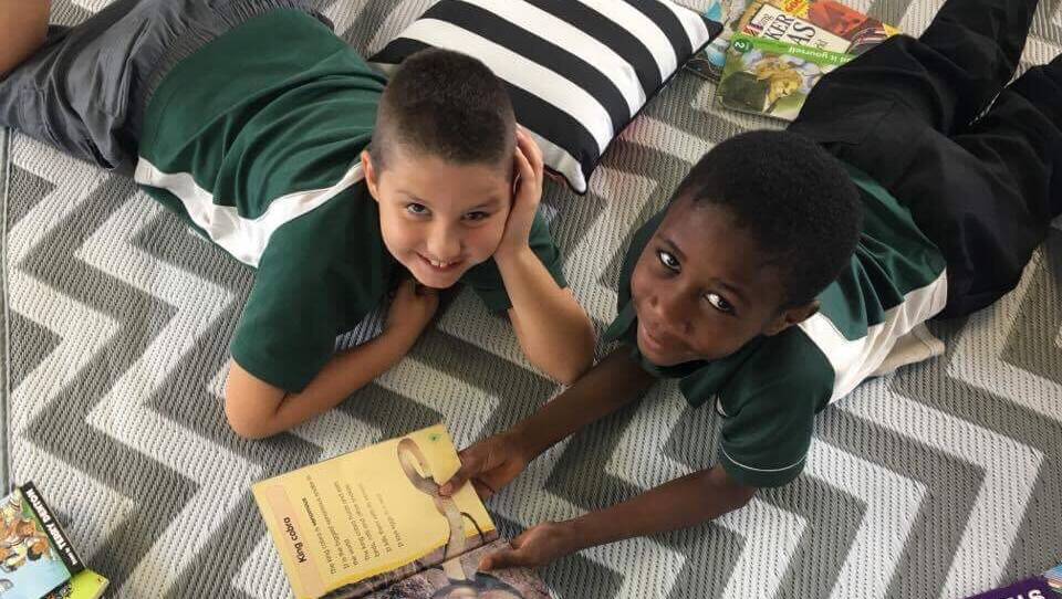 A READING SUCCESS: Warrawong Public School students are reading their way to better literacy levels with a new program. Picture: Supplied.