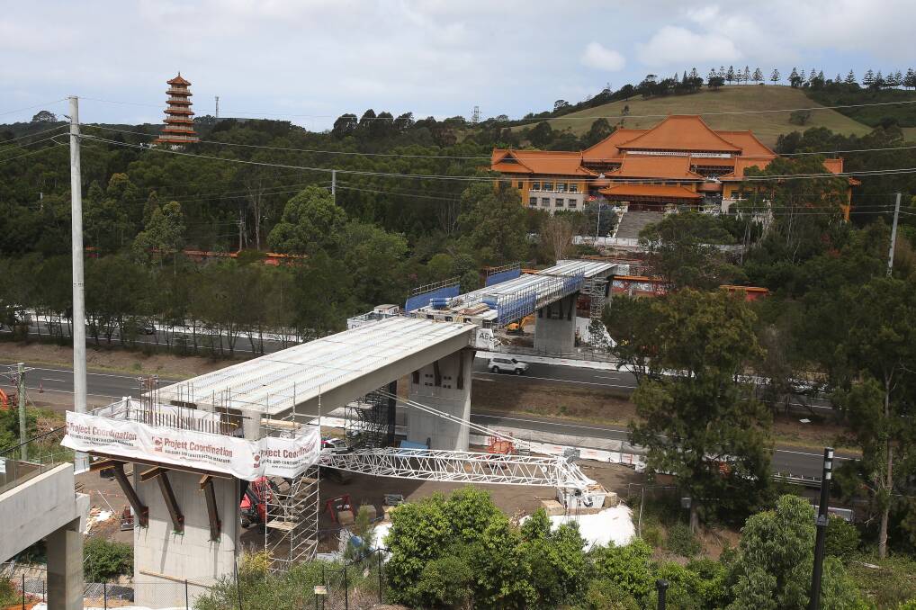 linking up: The new bridge connecting the Nan Tien Temple and institute over the M1 Princes Motorway. Picture: Robert Peet