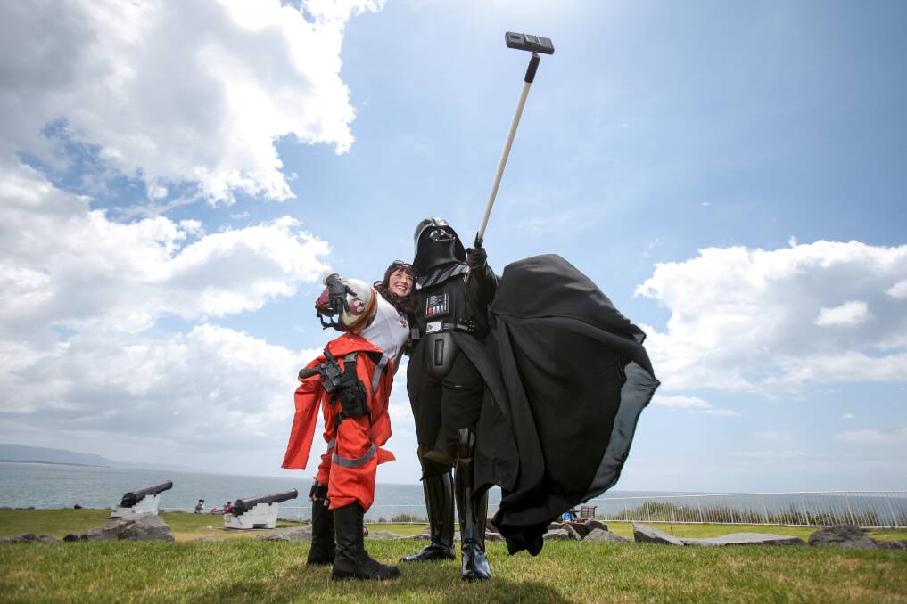 Gemma Parsons in her rebel fighter costume and Jason Zimmerman as Darth Vader pose are keenly awaiting the midnight premiere of the new Star Wars film. Picture: Adam McLean 