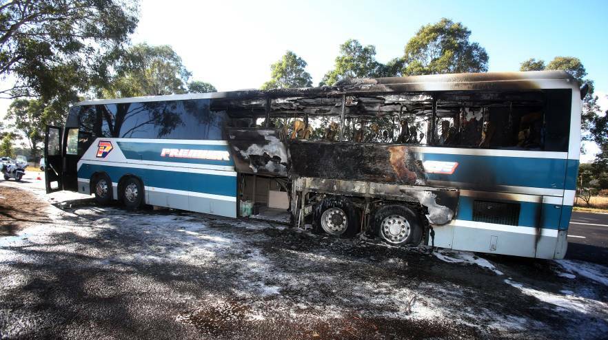 Kiama High School students have to clamber off their bus when it catches fire.