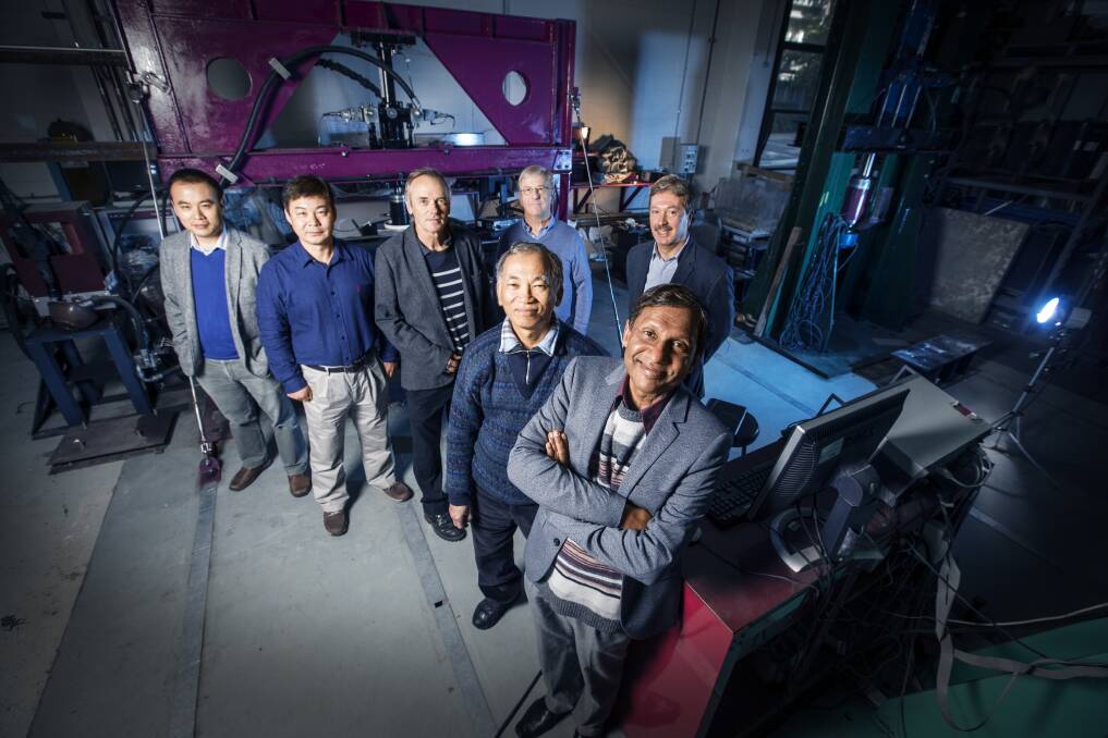 Professor Buddhima Indraratna (front) with some of the new $6 million rail centre's chief investigators. The centre aims to teach PhD students how to design and build rail lines.