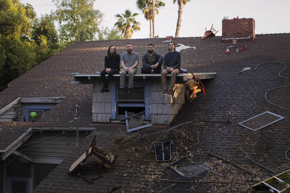 Get down: When Atlanta band Manchester Orchestra work out how to get down from the roof, they'll head to Wollongong to play a show. Picture: Mike Dempsey