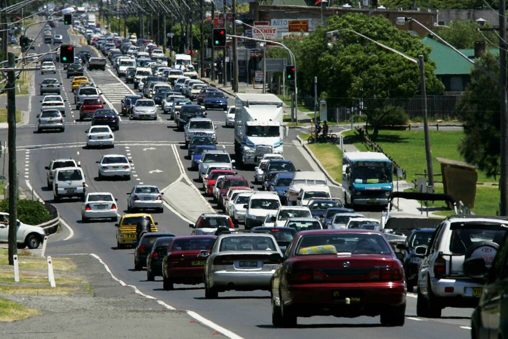 The Albion Park Rail Bypass will stop traffic jams like this, but the project may be around $100 million over budget.