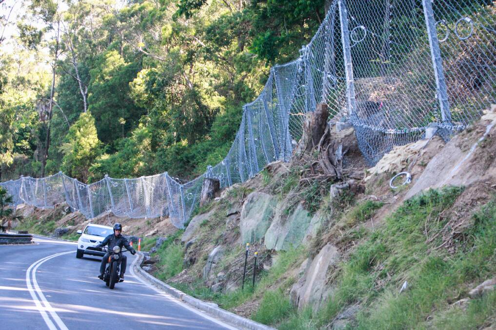 The stark view of Bulli Pass and the rockfall fencing just six months ago.