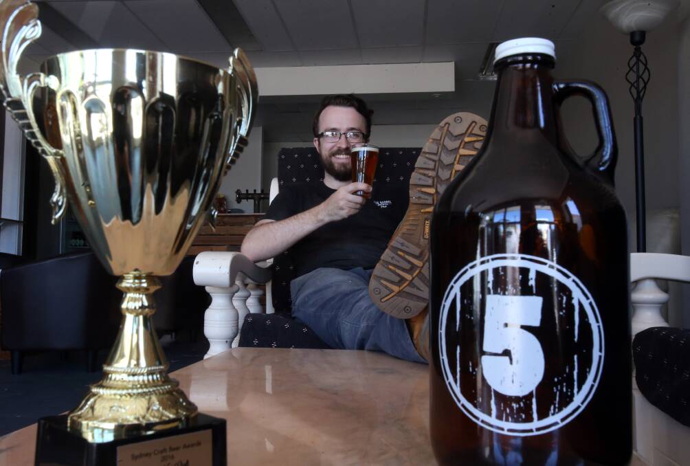 Five Barrel Brewing's Phil O'Shea with his trophy for Best New Brewery that he won at last week's Sydney Craft Beer Awards. Picture: Robert Peet