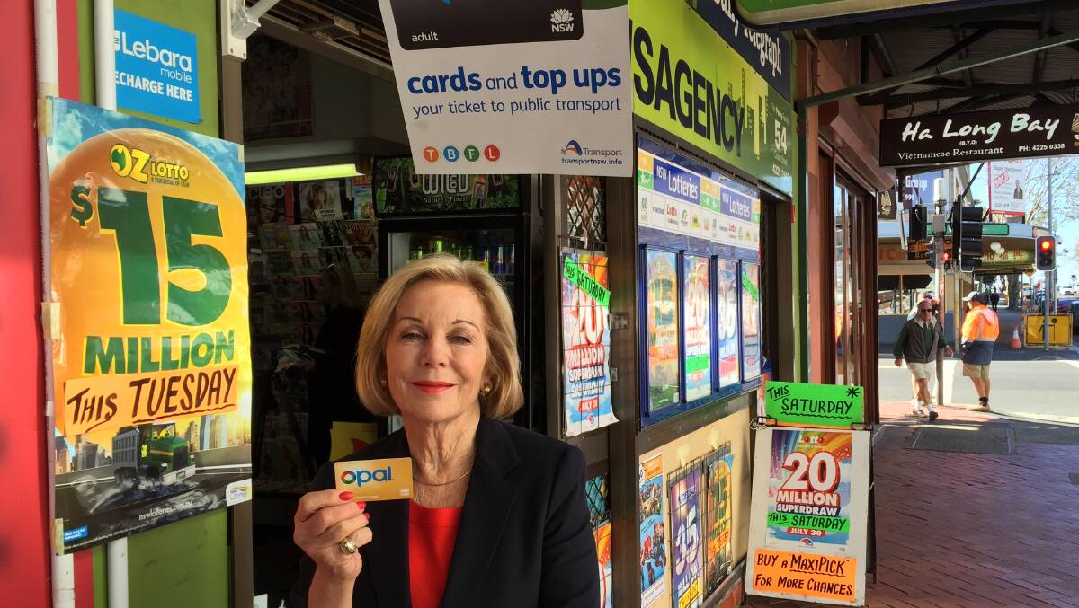 tickets please: Opal ambassador Ita Buttrose at Wollongong's Downtown Newsagency, one of the city's Opal retailers. Picture: Glen Humphries