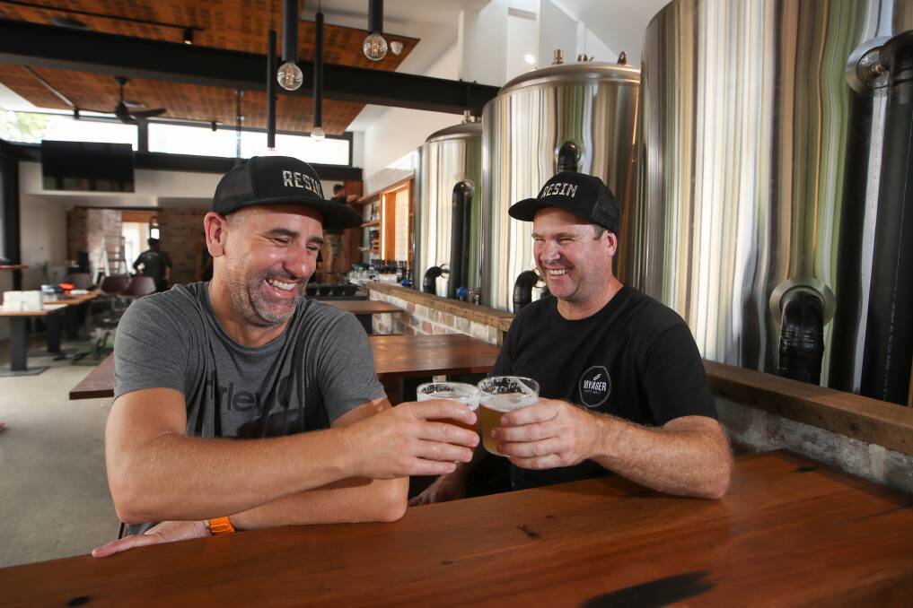Cheers: Resin Brewing partners Brendan Dowd and Stephen House are looking forward to opening the doors of their Bulli brewery next Wednesday. Picture: Adam McLean