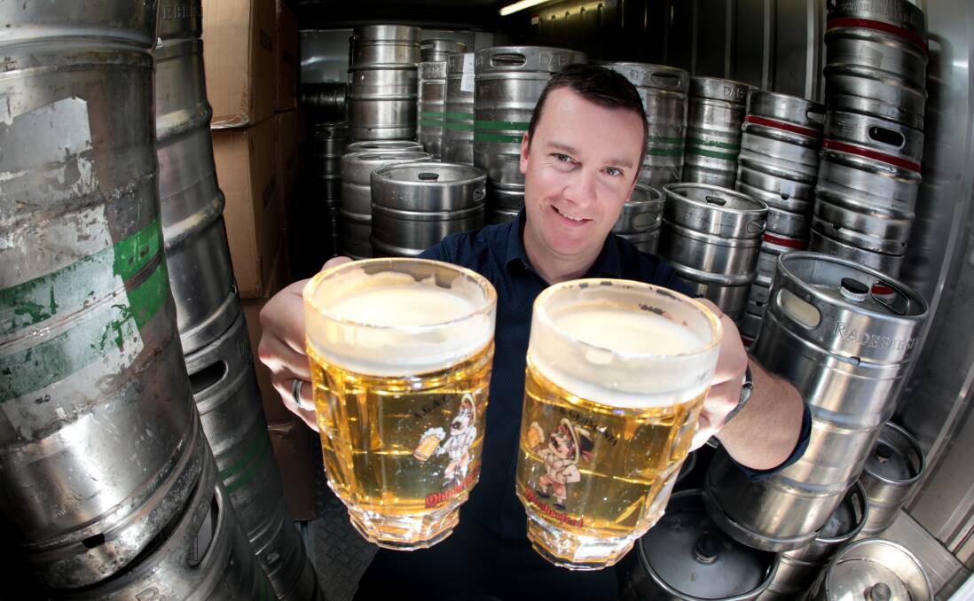 HERE'S CHEERS: Wollongong German Club secretary-manager Andrew Gunn road-tests some of the refreshments for this weekend's Oktoberfest. Picture: Adam McLean