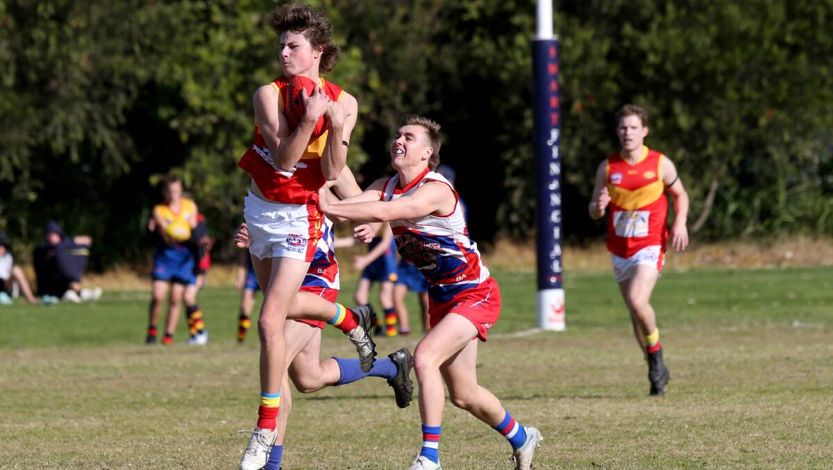 Nicholas Gordon takes a strong mark while playing for the Suns against the Bulldogs last year. Picture by Sylvia Liber