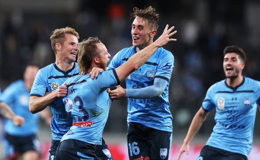 DELIGHT: Sydney FC's Joel King celebrates with Rhyan Grant after his teammate's match-winning goal on Sunday night. Picture: Matt King/Getty Images