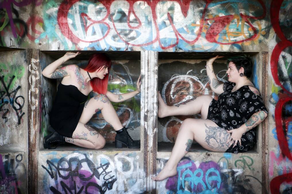 In the frame: Emma Neaves and Georgie Sault love to express themselves with their body art. They have shared their stories with the Illawarra Mercury for the More Than Skin Deep series. Pictures: Sylvia Liber