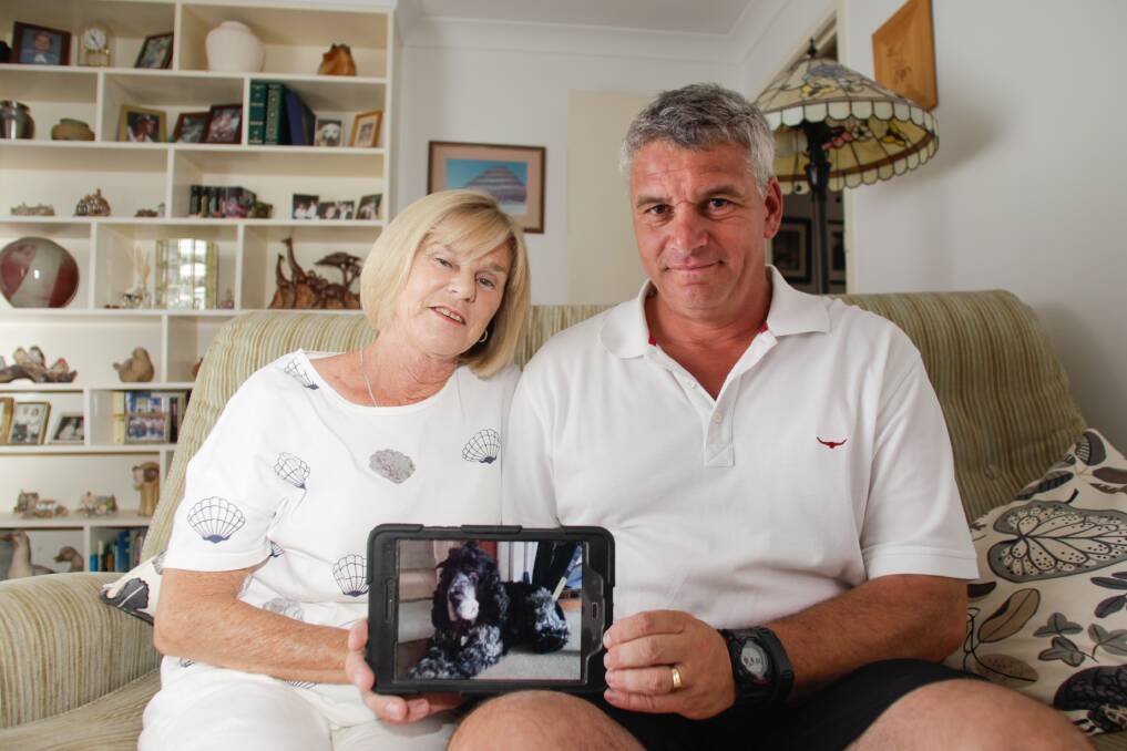 Old mate: Tony and Michele Leeder-Smith from Horsley, were saddened but said they were happy to have had their mate Timmy back to his old self, even if only for a short time. Picture: Georgia Matts 