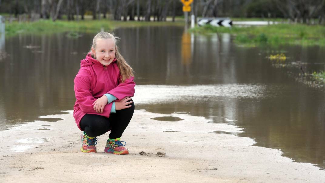 MIDDLE OF THE ROAD: Katelyn Hughes at Pryors Road, Horsham. Rivers and creeks are receding but flash flooding might occur following predicted rain and thunderstorms. Picture: PAUL CARRACHER