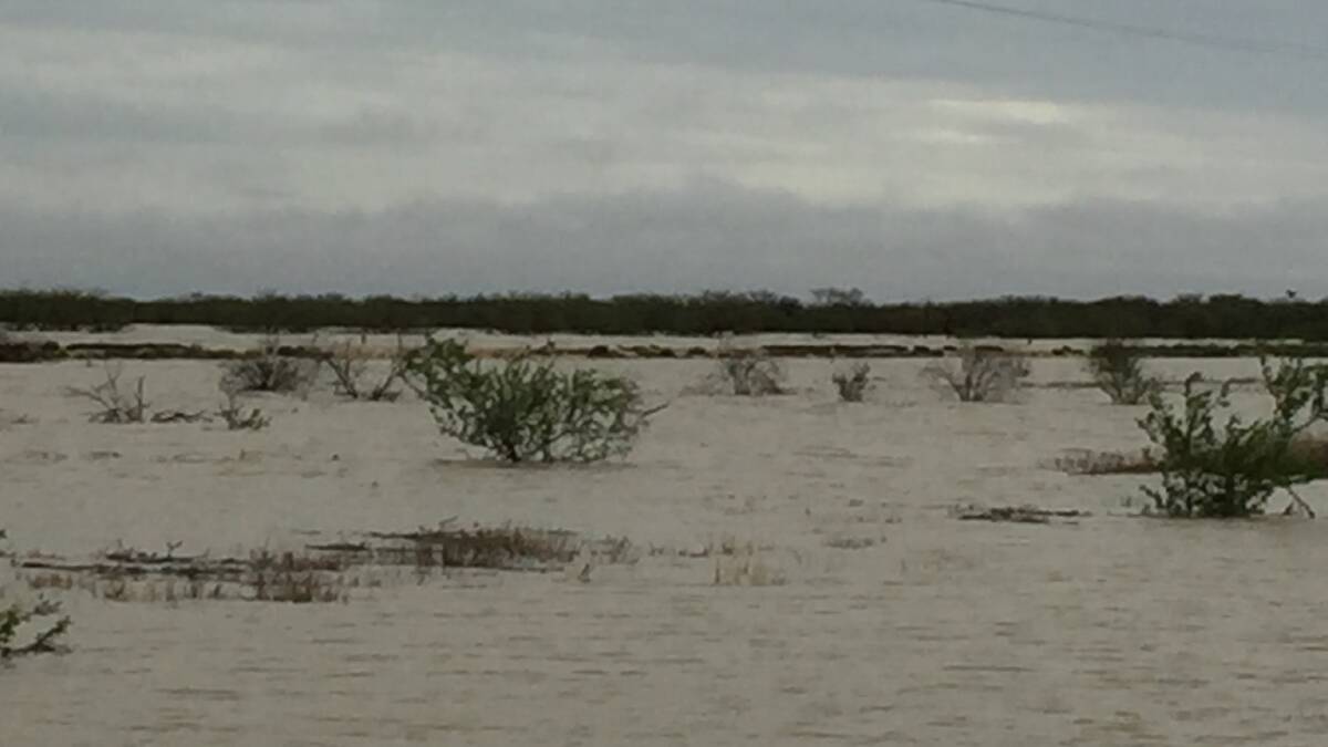 A photograph taken on December 27 at Spellary Creek, east of Julia Creek, showing a section of washed-away railway line. Picture: Zoe Searle.