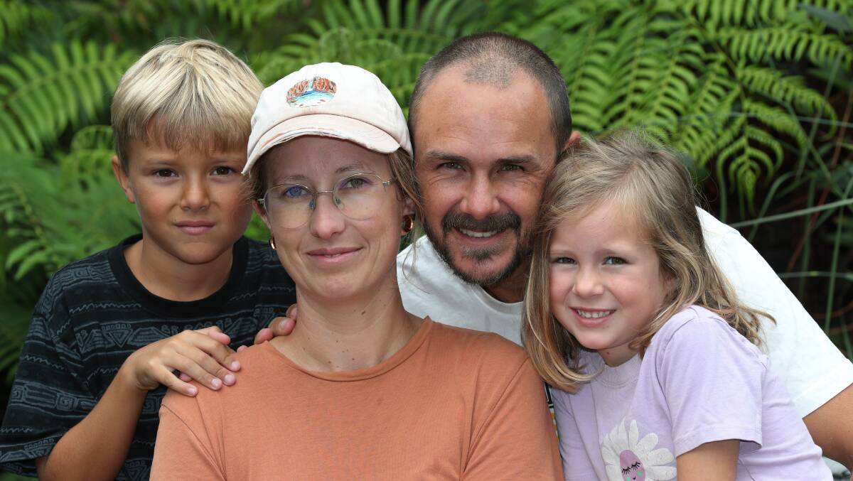 Duane Byrnes and Lauren Curlewis with their children Jarli and Alina at their Thirroul home. Picture by Robert Peet