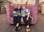 Author Hayley Scrivenor with her mum, Danina, and Wollongong City Libraries' most borrowed book of 2023 - Dirt Town. Picture by Adam McLean 